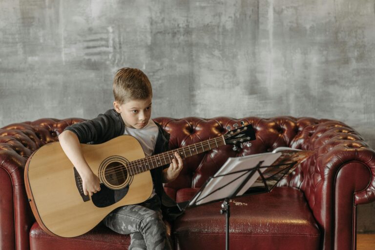 Child playing guitar